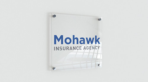 Mohawk Insurance logo on office wall - Indepenedent Insurance Agency Consultation Advice